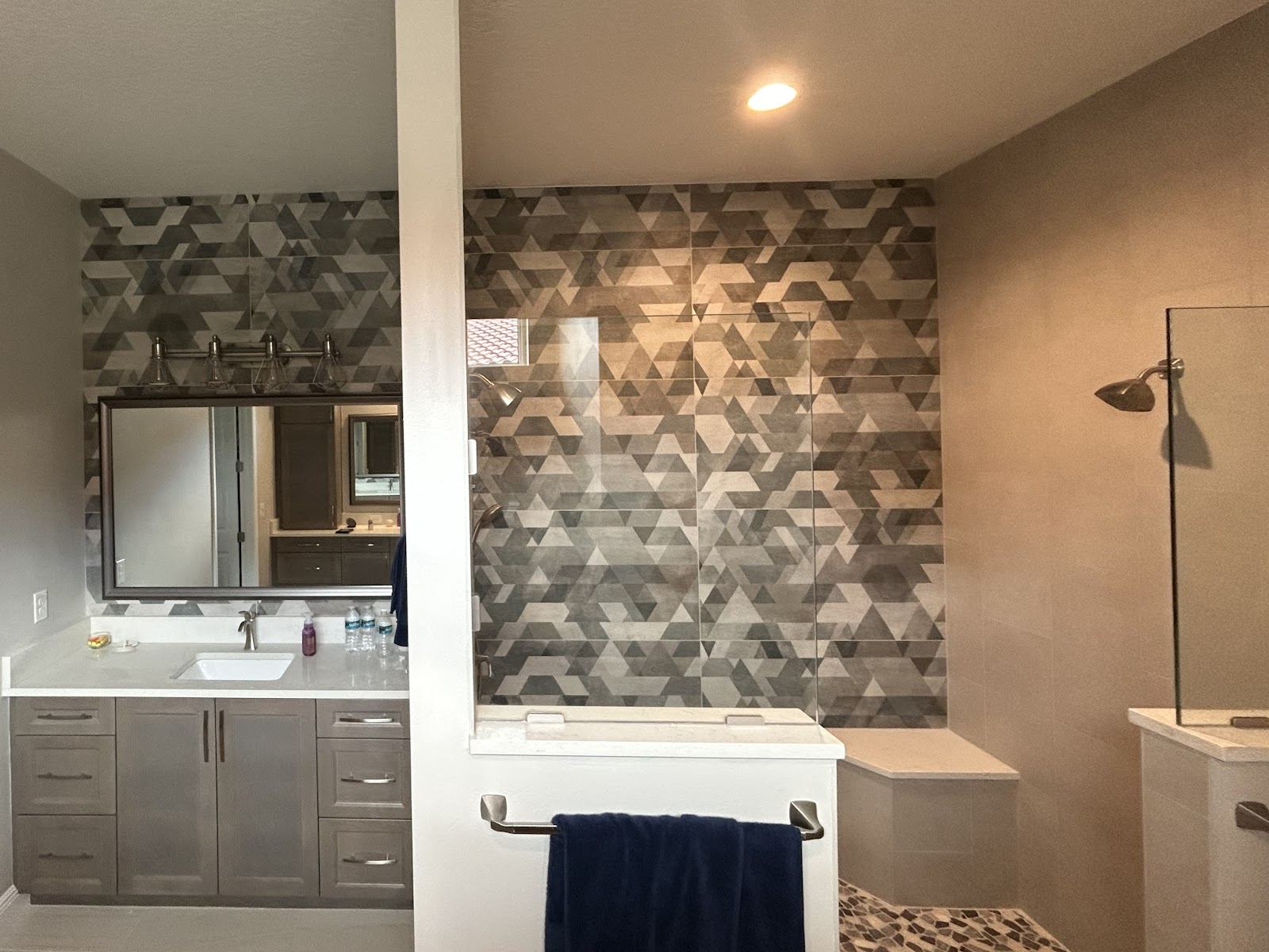 Dimensional geometric tile walk-in shower by 321 Tile